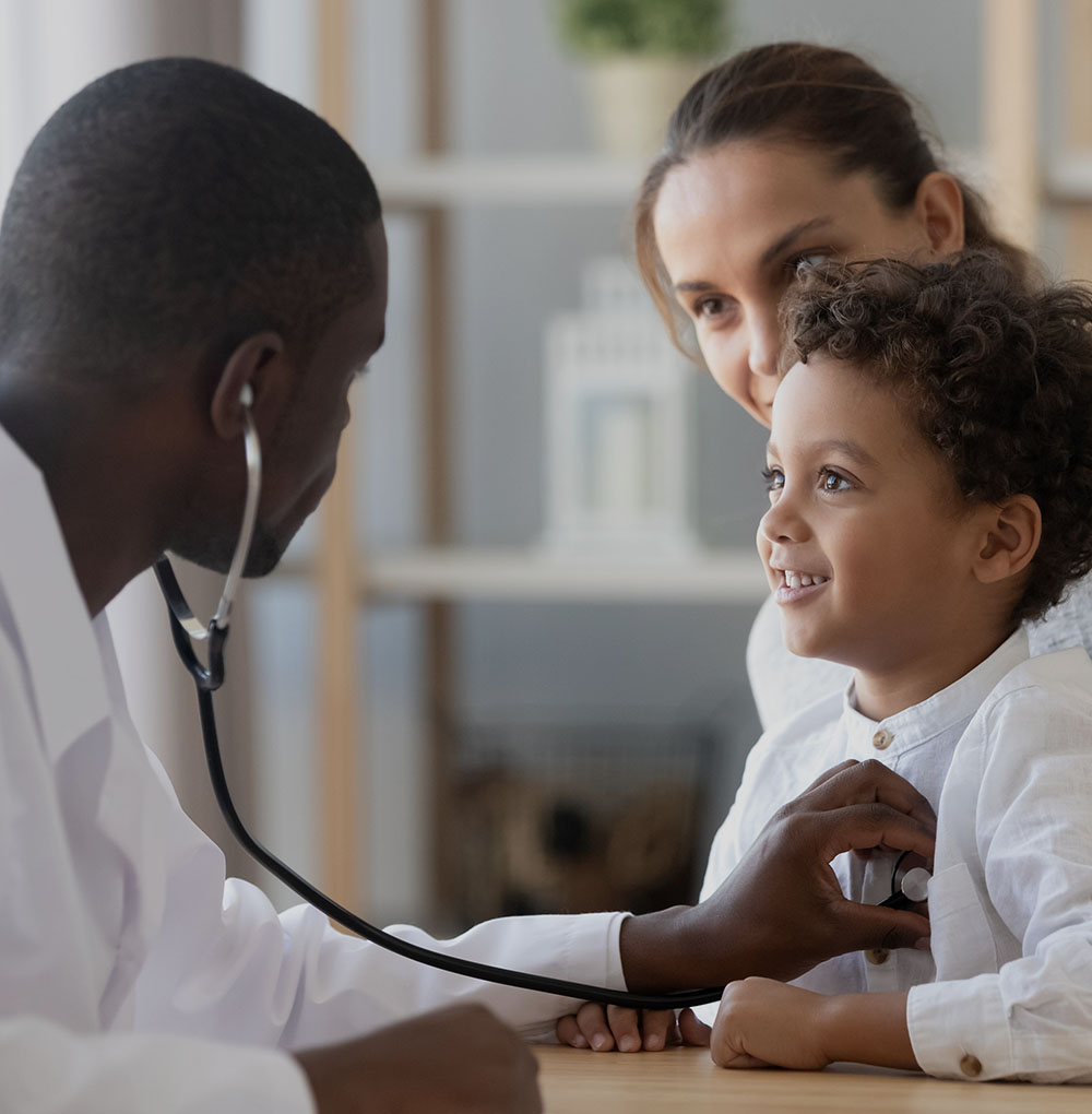 child smiling at doctor