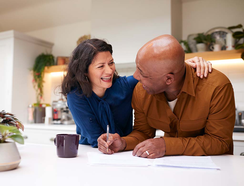 Couple filling out paperwork.